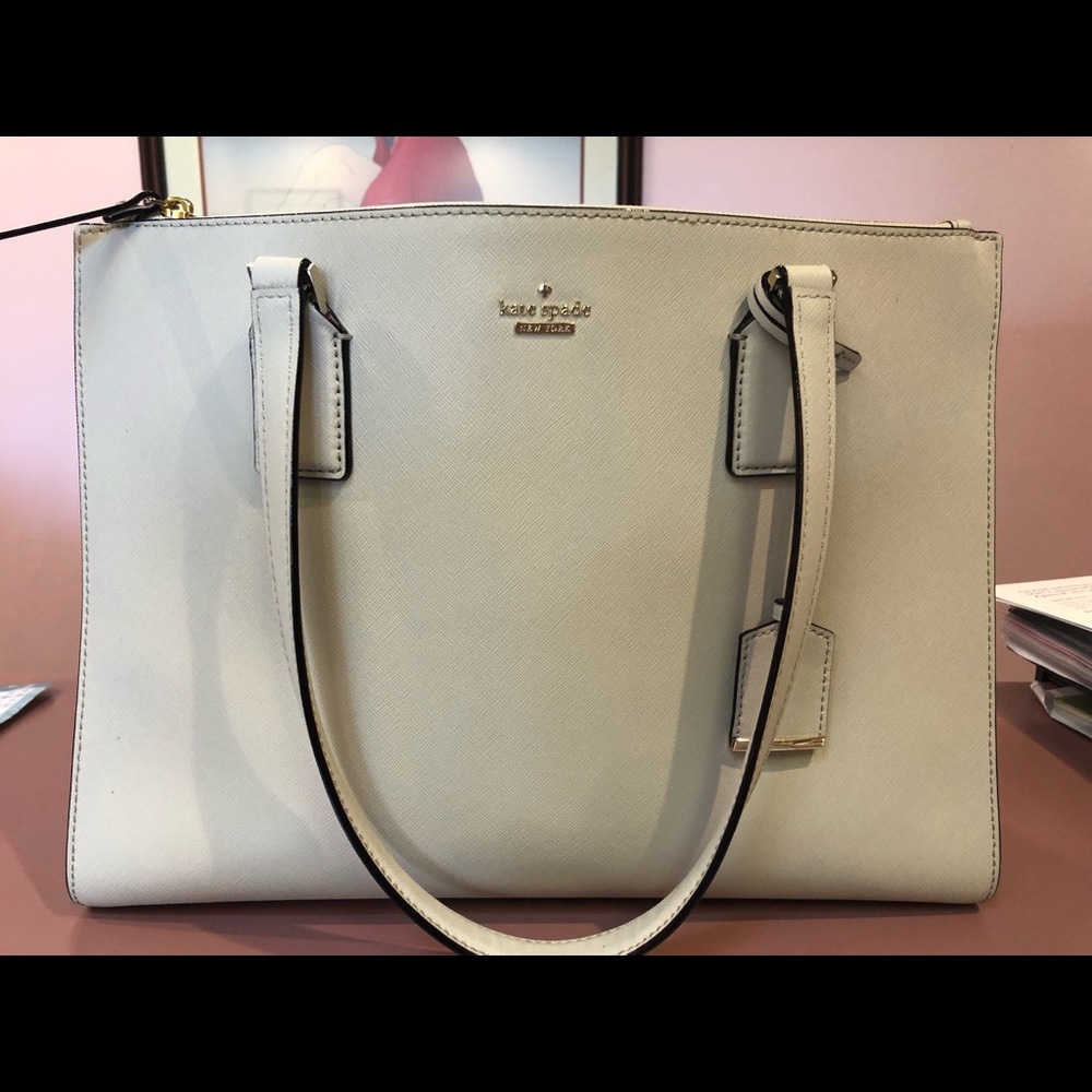 USED Kate spade “tusk” color bag.